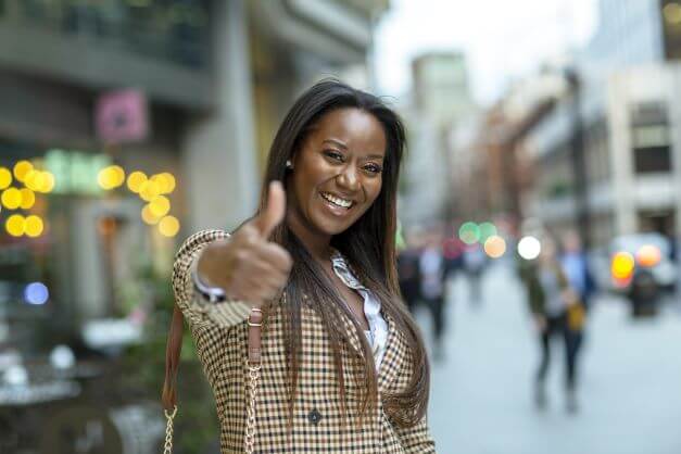 Why becoming more adaptable can help YOU cope with difficult changes in 2022 3 a smiling woman shows how to cope with difficult changes with a positive attitude