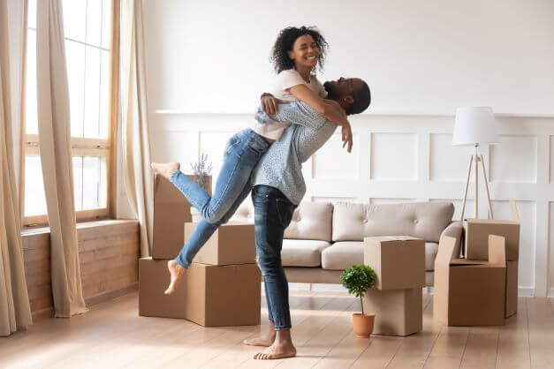 couple celebrate First Home