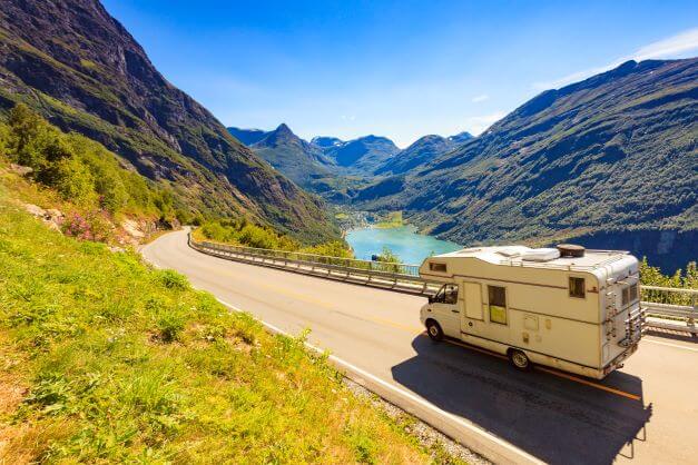 Tour Europe in a Campervan by Geiranger fjord