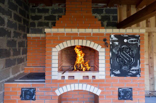 Outdoor Kitchen With Pizza Oven And Barbeque Grill for summer