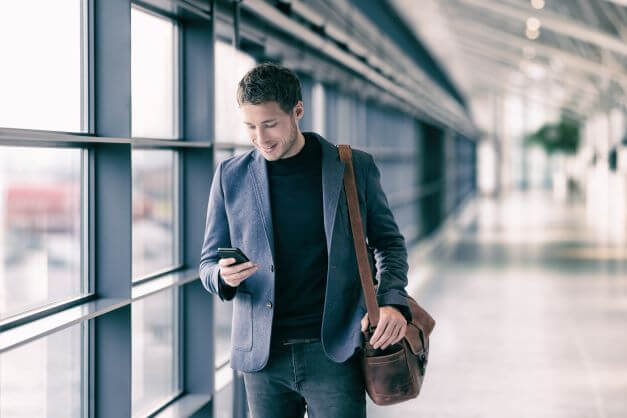 man travelling in smart casual attire