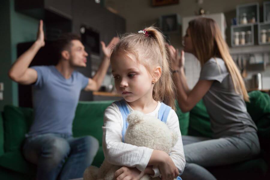 couple argue with child upset