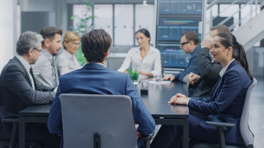 A boardroom meeting with diverse board members 1