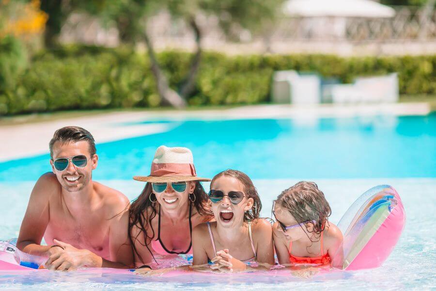 Why all-inclusive holidays are perfect for multi-generational trips 2 family in pool on holiday