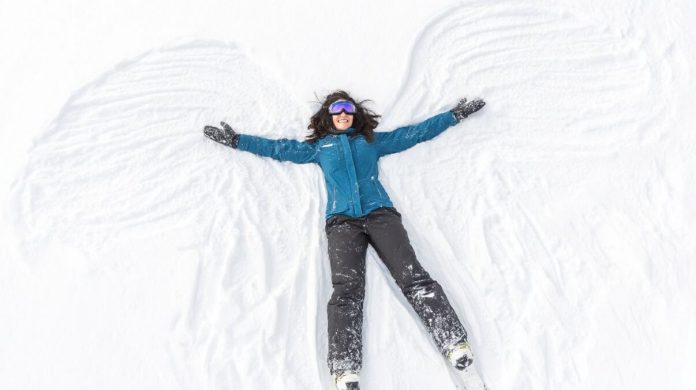 gwen making a snow angel