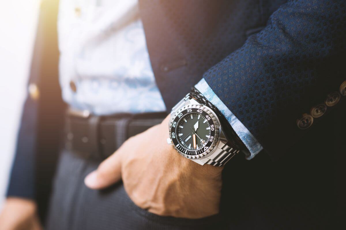 Timeless Jewellery Gift Ideas for Every Occasion 2 Man wearing a luxury engraved watch, a classic anniversary or achievement gift