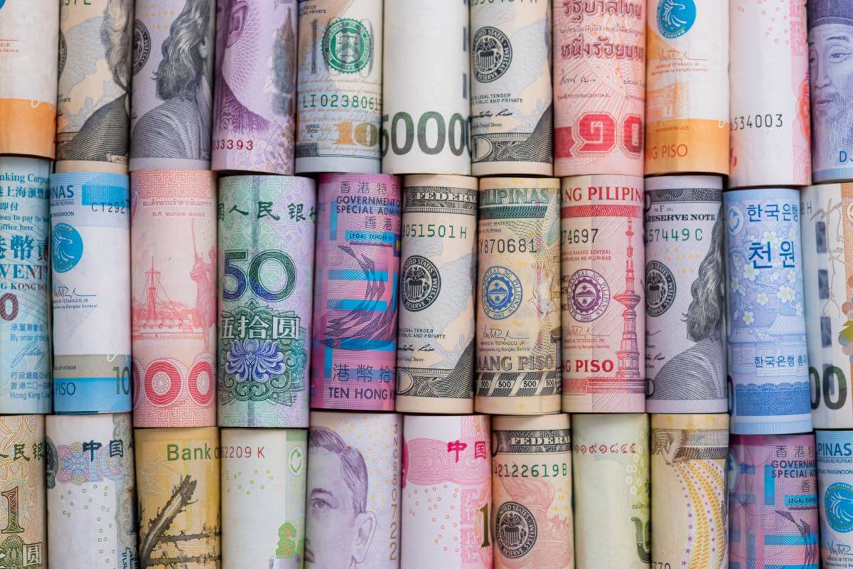 Where to Get Travel Money in 2025: Best Local Exchange Rates Made Easy 1 World banknotes and currencies spread out, representing international travel money