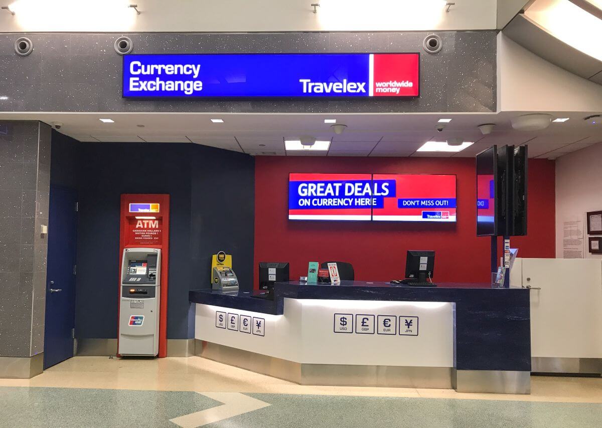 Where to Get Travel Money in 2025: Best Local Exchange Rates Made Easy 2 Airport currency exchange kiosk showing bureau de change in terminal