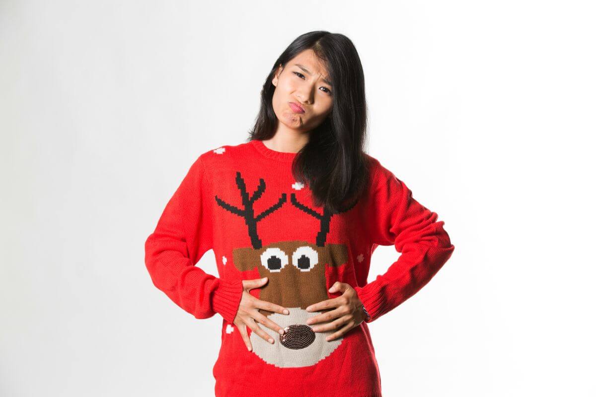 woman wearing a christmas jumper
