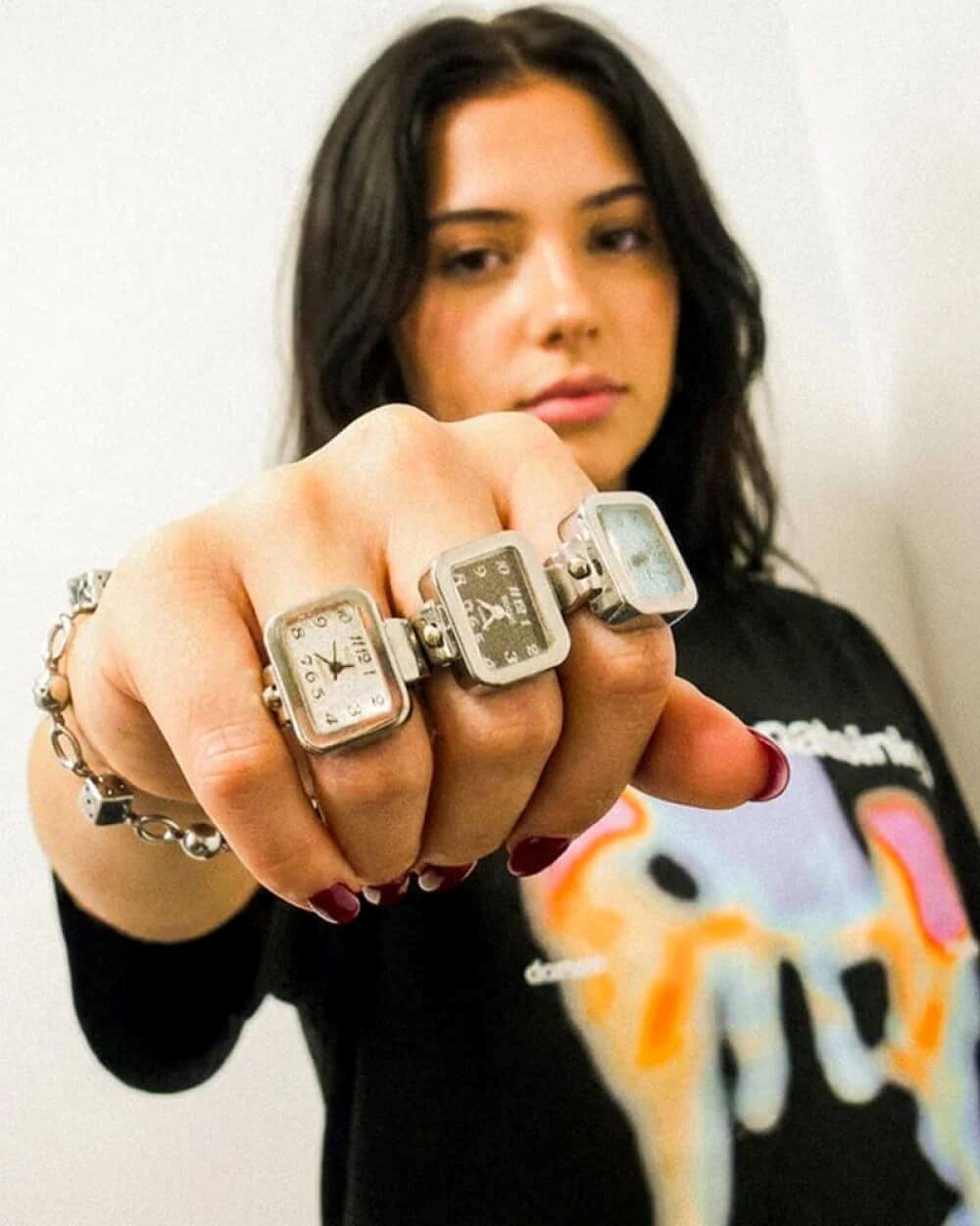 Domno jewellery rings styled with streetwear graphic T-shirt