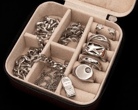 Domno streetwear jewellery collection featuring chain necklaces, rings and pendant accessories