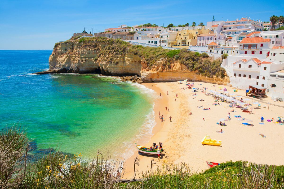 Algarve beach with cliffs and clear blue sea in southern Portugal