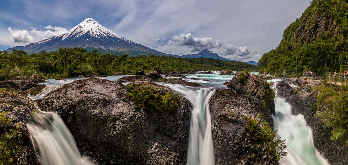 Chile Holidays: Santiago and the Chilean Lake District 2 Petrohue Waterfalls with snow capped Osorno Volcano seen in the background Vicente Perez Rosales National Park Lake District Chile